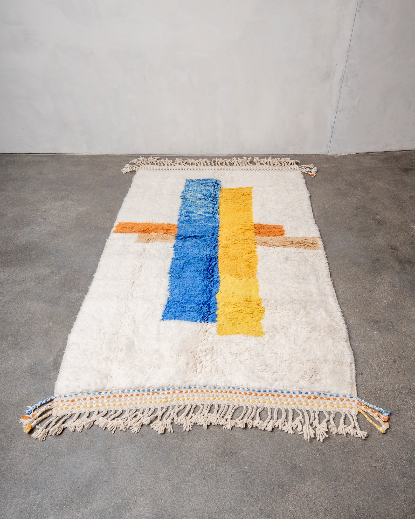 Modern, designer, handcrafted Berber rug from Morocco. Beniourain carpet with beautiful colours and patterns and fluffy wool texture.